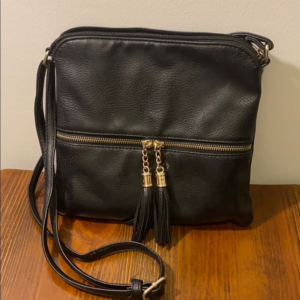 Black vegan leather tassel bag